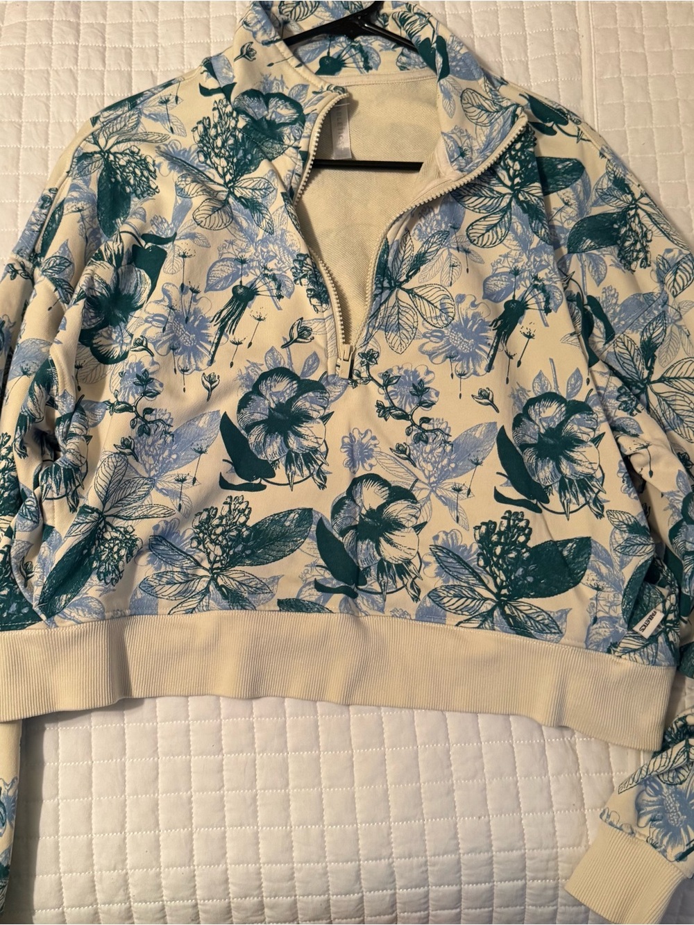 Fabletics Cream Half-Zip Sweatshirt with Teal Floral Print